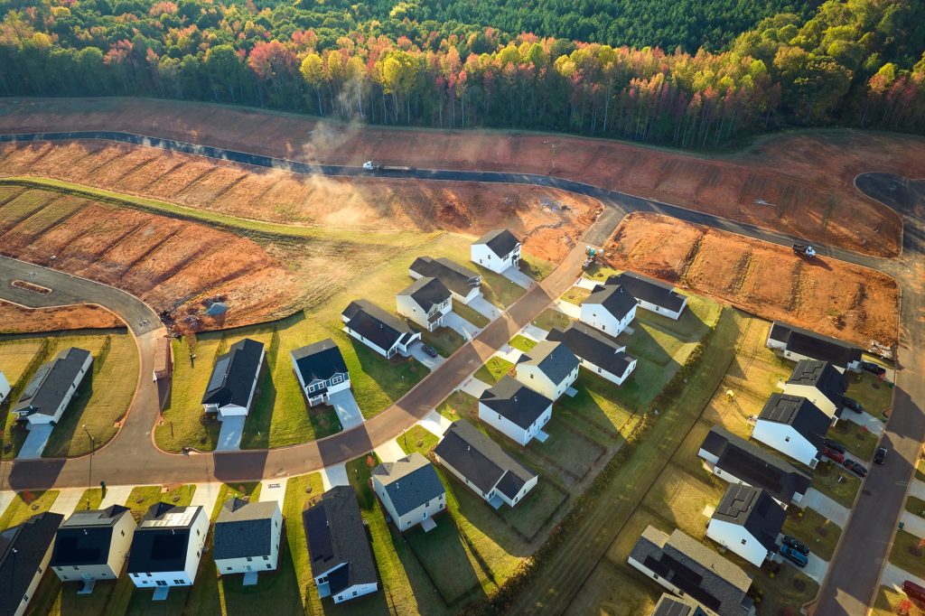 Aerial view of real estate development with tightly located family houses